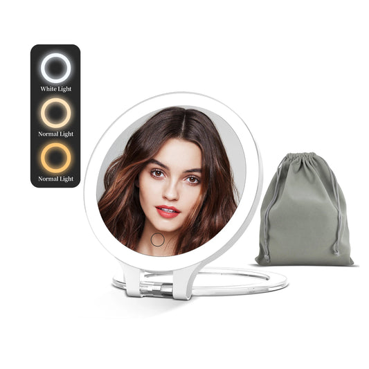 Funtouch compact makeup mirror with 10x magnification LED light, showing close-up view for eyeliner, eyebrows, and lip makeup.