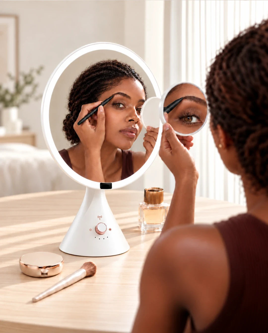 Woman applying eye makeup using the FUNTOUCH RM321 white lighted makeup mirror.