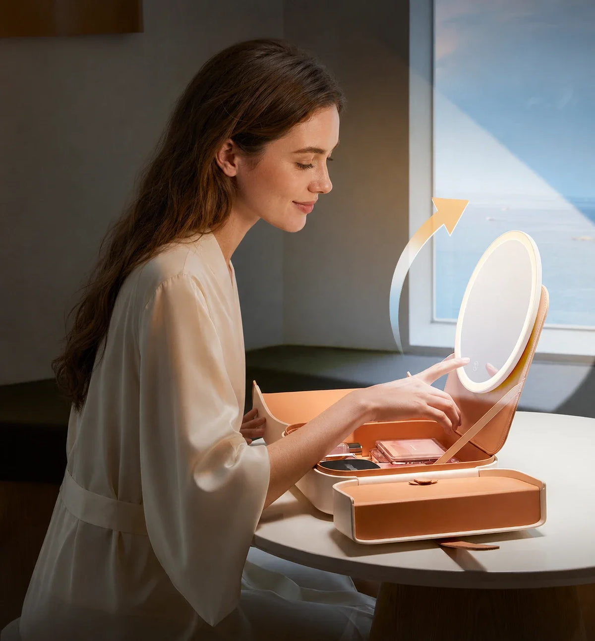 A generous round LED mirror creates a clear, flattering view wherever you get ready.