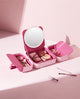 Pink makeup organizer case with LED mirror and multiple compartments for cosmetics, brushes and beauty accessories.