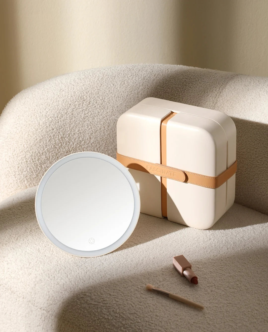 Beige portable makeup case with detachable round LED mirror, designed for travel and everyday beauty routines.